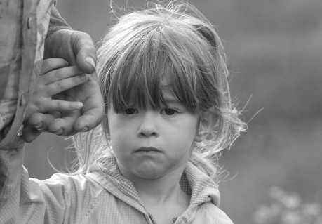 Child Holding Someone's Hand